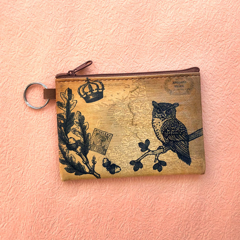 vegan brand LAVISHY's unisex key ring coin purse with vintage style owl illustration on the old map background print. Great for everyday use, travel & gift for friends & family. Wholesale at www.lavishy.com for gift shop, fashion accessories & clothing boutiques, book stores worldwide since 2001.