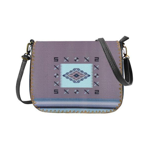 Mlavi Studio's whimsical vegan crossbody bag with Bohemian style Mexican textile pattern print. It's roomy enough to hold wallet, smart phone and small personal items like key and lip balm. Wholesale at www.mlavi.com for gift shops, fashion accessories & clothing boutiques, museum stores worldwide.