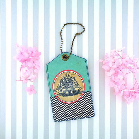 Eco-friendly, cruelty-free, ethically made sailing ship print vegan luggage tag by Mlavi Studio. Great for travel or as gift for family & friends. Wholesale at www.mlavi.com to gift shop, clothing & fashion accessories boutiques, book stores.