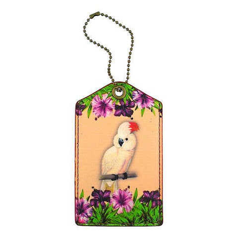 Mlavi vegan leather vintage style luggage tag features whimsical parrot & hibiscus flower illustration. A great gift idea for yourself & your friends & family. More whimsical fashion accessories are available for wholesale at www.mlavi.com for gift shop,  , fashion accessories & clothing boutique buyers in Canada, USA & worldwide.