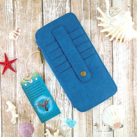 Eco-friendly, cruelty-free, ethically made seahorse print vegan cardholder by Mlavi Studio. Great for travel or as gift for family & friends. Wholesale at www.mlavi.com to gift shop, clothing & fashion accessories boutiques, book stores.
