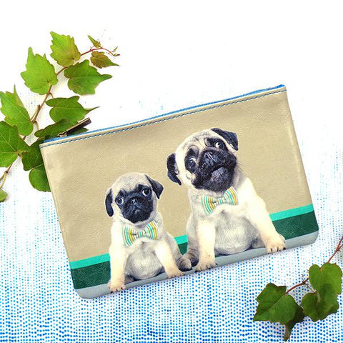 Mlavi Eco-friendly vegan leather medium/makeup pouch with pug daddy and pug puppy print. It's great for everyday use & a unique gift for yourself, family & friends. More pet/dog/cat/animal theme fashion accessories are available for wholesale at www.mlavi.com for gift & boutique buyers worldwide.