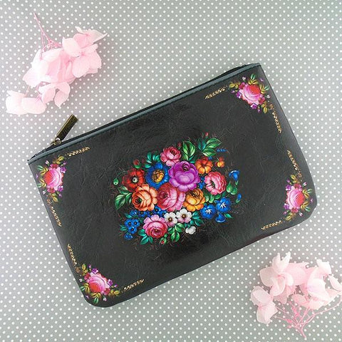 Mlavi vegan leather medium flat/makeup pouch for women with Ukrainian flower print print. Great for everyday use & a unique gift for yourself & family & friends. More Ukraine themed bags, wallets & other fashion accessories are available for wholesale at www.mlavi.com for gift & boutique buyers worldwide.
