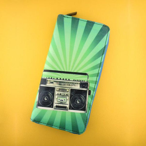 Mlavi retro boombox & cassette print vegan large wristlet wallet made with cruelty-free Eco-friendly vegan materials. Great for everyday use, travel or as gift for family & friends. Wholesale at www.mlavi.com to gift shop, clothing & fashion accessories boutiques, book stores worldwide.