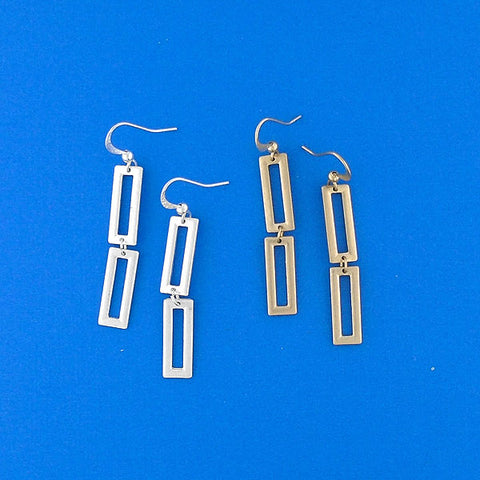 1-142: Silver/gold plated earrings