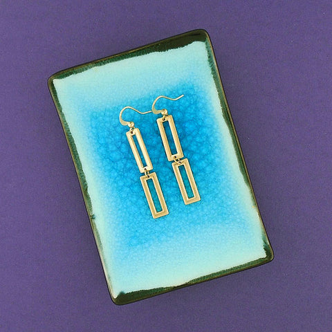 1-142: Silver/gold plated earrings