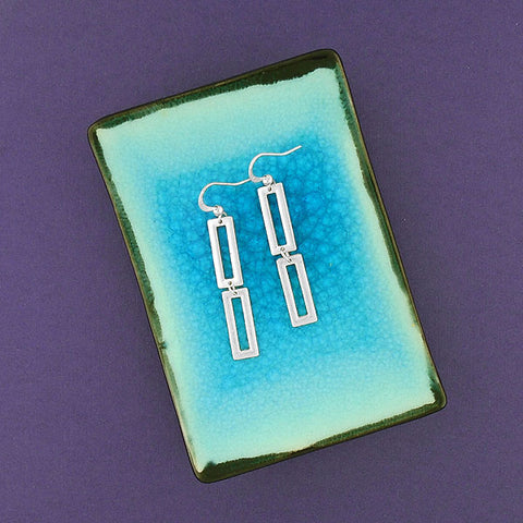 1-142: Silver/gold plated earrings