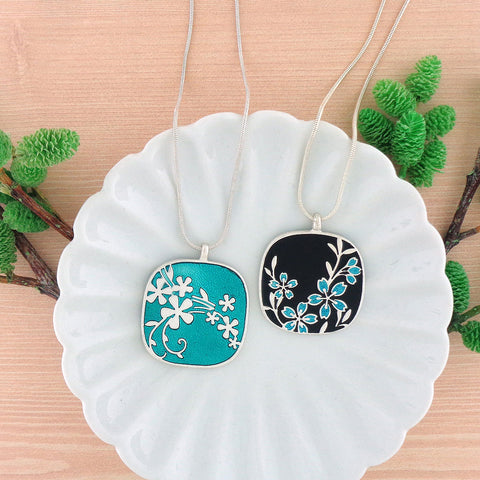 LAVISHY handmade silver plated reversible cherry blossom flower & vine pattern enamel necklace. Great for everyday wear/gift ideas. Wholesale at www.lavishy.com