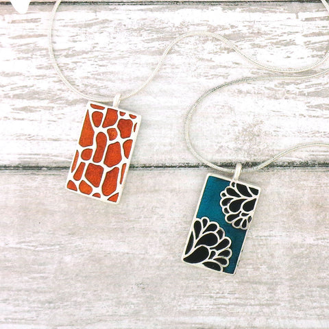 LAVISHY handmade reversible enamel abstract flower & giraffe pattern pendant necklace. Great gift idea for friends & family. Wholesale at www.lavishy.com