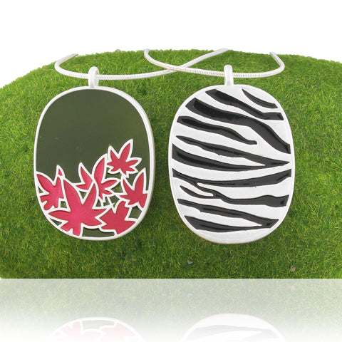 101-026: Enamel Maple Leaf & Animal Print Reversible Necklace