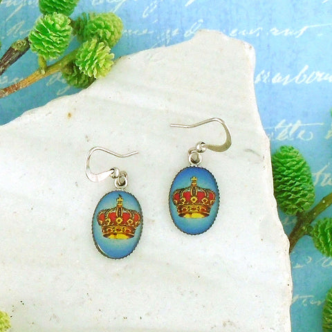 LAVISHY design & wholesale handmade rhodium plated dainty earrings with playful pop art print to gift shops, clothing & fashion accessories boutiques, book stores in Canada, USA & worldwide since 2001.