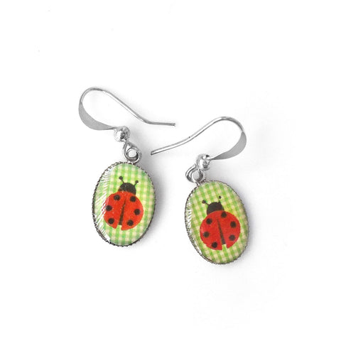 LAVISHY cute handmade dainty rhodium plated crown earrings for online shopping. Fun to wear, playful & quirky gift gift idea for family & friends. Wholesale at www.lavishy.com