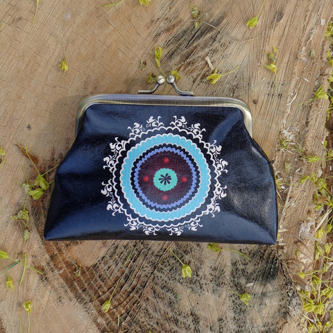 Mlavi bohemian style Ikat print vegan kiss lock frame coin purse. Great for everyday use & wonderful as a gift to family & friends. Wholesale at www.mlavi.com