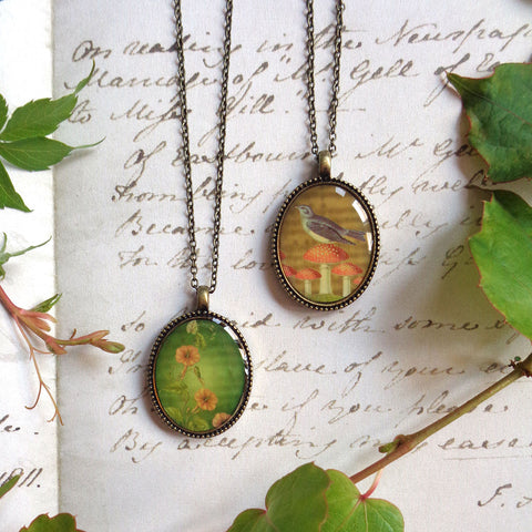LAVISHY vintage style handmade reversible pendant necklace with lucky blue bird on top of lucky mushroom/Amanita muscaria & morning glory flowers print. Wholesale at www.lavishy.com