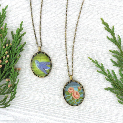 LAVISHY vintage style handmade reversible pendant necklace with lucky blue bird & rose flower print. Great gift for friend & family. Wholesale at www.lavishy.com
