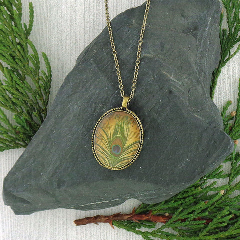 LAVISHY vintage style handmade reversible pendant necklace with  peacock feather print. Great gift for friend & family. Wholesale at www.lavishy.com