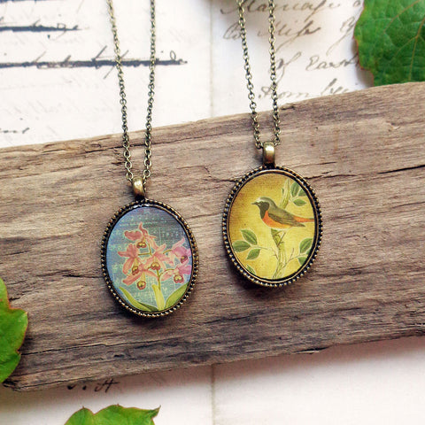 LAVISHY vintage style handmade reversible pendant necklace with bird & orchid flowers print. Great gift for friends & family. Wholesale at www.lavishy.com