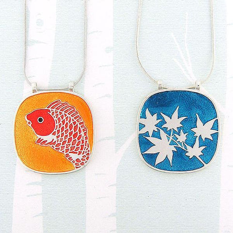 Online shopping for LAVISHY handmade silver plated enamel koi fish & maple leaf reversible pendant necklace. A great gift for you or your girlfriend, wife, co-worker, friend & family. Wholesale available at www.lavishy.com for gift shops and boutiques in Canada, USA & worldwide.