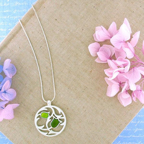 Shop LAVISHY handmade silver plated reversible tulips flower enamel necklace. A great gift for you or your girlfriend, wife, co-worker, friend & family. Wholesale available at www.lavishy.com with many unique & fun fashion accessories for gift shops and boutiques in Canada, USA & worldwide.