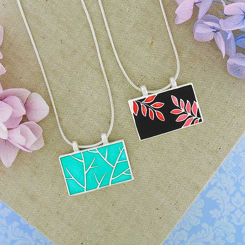 Online shopping for LAVISHY's handmade silver plated reversible pendant necklace with colorful tree branch & leaf enamel enamel motifs. Great for everyday wear & lovely gift for friends & family. Wholesale at www.lavishy.com for gift shops, clothing & fashion accessories boutiques in Canada, USA & worldwide since 2001.