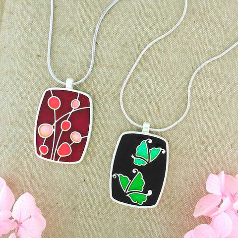 Online shopping for LAVISHY's handmade silver plated reversible pendant necklace with colorful Japanese style love butterflies enamel pattern. Great for everyday wear & lovely gift for friends & family. Wholesale at www.lavishy.com for gift shops, clothing & fashion accessories boutiques in Canada, USA & worldwide since 2001.