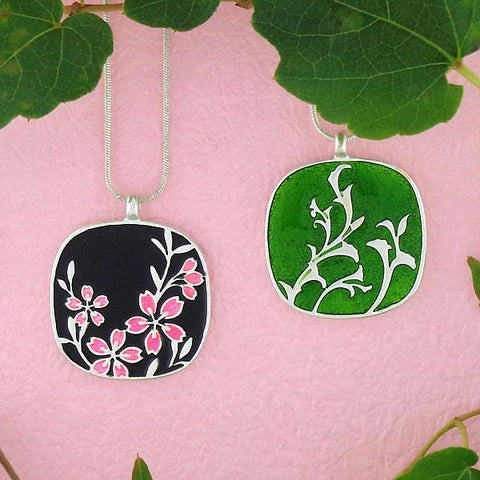 Online shopping for LAVISHY handmade silver plated reversible cherry blossom flower & vine pattern enamel necklace. Great for everyday wear, as gifts for family & friends. Wholesale available at www.lavishy.com with many unique & fun fashion accessories for gift shops and boutiques in Canada, USA & worldwide.