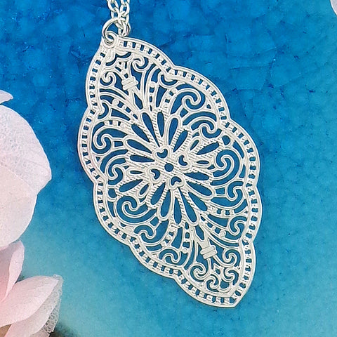 Online shopping for LAVISHY unique, beautiful & affordable light weight intricate filigree pendant necklace. Great for everyday wear, or as gift for family & friends. Wholesale at www.lavishy.com for gift shop, clothing & fashion accessories boutique, book store since 2001.