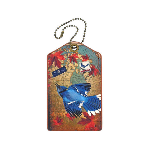 Online shopping for vegan brand LAVISHY's cool vegan/faux leather luggage tag with vintage style Canadian blue jay illustration on the Canadian map background print. It's a great traveler or as a gift. Wholesale available at www.lavishy.com with other unique fashion/travel accessories/souvenirs.