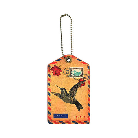 Online shopping for vegan brand LAVISHY's cool vegan/faux leather luggage tag with vintage style Canadian hummingbird illustration on the Canadian map background print. It's a great traveler or as a gift. Wholesale available at www.lavishy.com with other unique fashion/travel accessories/souvenirs.