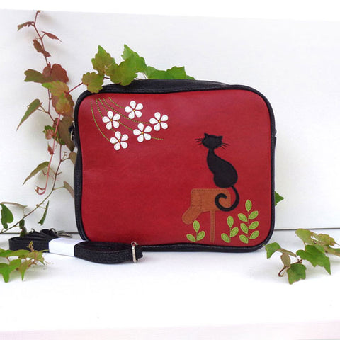LAVISHY fun & playful applique vegan leather cross body bag/toiletry bag with adorable cat on mailbox applique. It's Eco-friendly, ethically made, cruelty free. A great gift for you or your friends & family. Wholesale available at www.lavishy.com with many unique & fun fashion accessories.