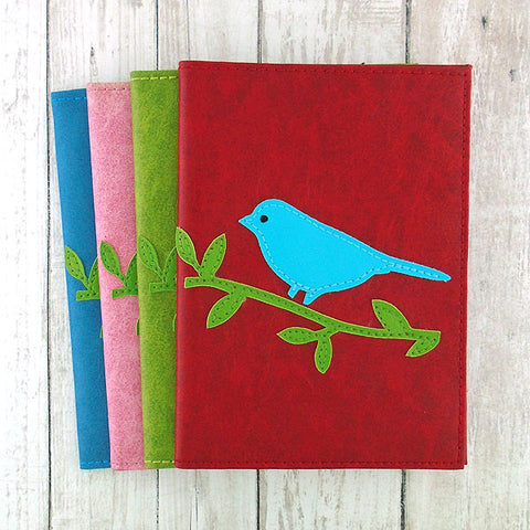LAVISHY Eco-friendly cherry applique vegan leather passport cover. Great for travel or gift for your family and friends. Wholesale at www.lavishy.com for gift shops, clothing and fashion accessories boutiques, book stores in Canada, USA and worldwide since 2001.
