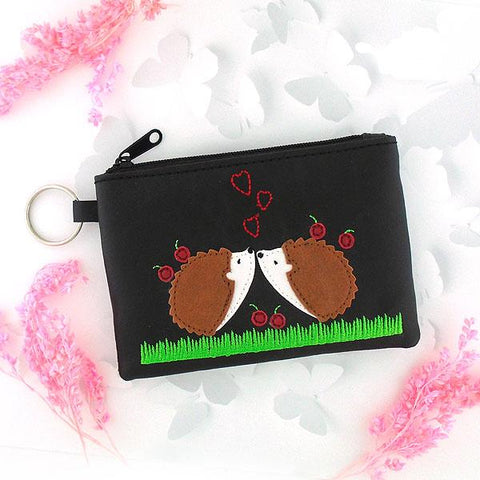 Online shopping for vegan brand LAVISHY's playful applique vegan key ring coin purse with adorable hedgehog applique. Great for everyday use, fun gift for family & friends. Wholesale at www.lavishy.com for gift shop, clothing & fashion accessories boutique, book store in Canada, USA & worldwide since 2001.