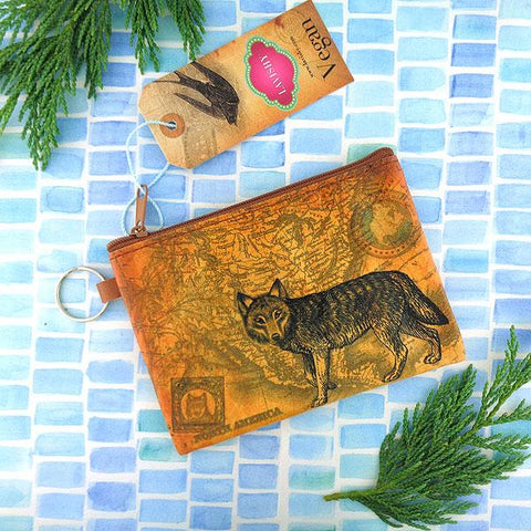 vegan brand LAVISHY's unisex key ring coin purse with vintage style wolf illustration on the old map background print. Great for everyday use, travel & gift for friends & family. Wholesale at www.lavishy.com for gift Online shopping for LAVISHYs, fashion accessories & clothing boutiques, book stores worldwide since 2001.