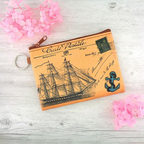 vegan brand LAVISHY's unisex key ring coin purse with vintage style boat illustration on the old map background print. Great for everyday use, travel & gift for friends & family. Wholesale at www.lavishy.com for gift Online shopping for LAVISHYs, fashion accessories & clothing boutiques, book stores worldwide since 2001.