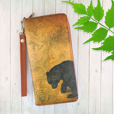 LAVISHY cool vegan/faux leather wristlet wallet with vintage style bear illustration on old map background print. It's a great for everyday use & gift for traveler. Wholesale available at www.lavishy.com with other unique fashion accessories/souvenirs.