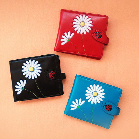 LAVISHY Eco-friendly embossed daisy & ladybug vegan leather medium bi-fold wallet for women. Great for everyday use or as gift idea for friends & family. 