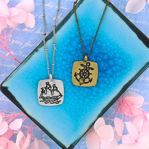 LAVISHY handmade vintage style boat & wheel/anchor reversible necklace