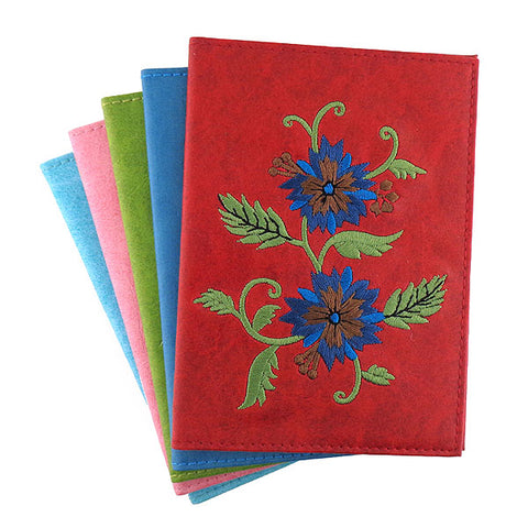 vegan brand LAVISHY's Eco-friendly, ethically made, cruelty free passport cover with carnation flower embroidery. Wholesale available at www.lavishy.com along with other unique & fun vegan fashion accessories for retailers like gift shops, fashion accessories & clothing boutiques.