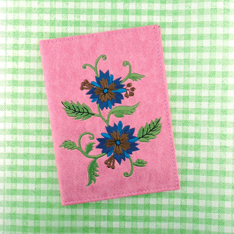 vegan brand LAVISHY's Eco-friendly, ethically made, cruelty free passport cover with carnation flower embroidery. Wholesale available at www.lavishy.com along with other unique & fun vegan fashion accessories for retailers like gift shops, fashion accessories & clothing boutiques.