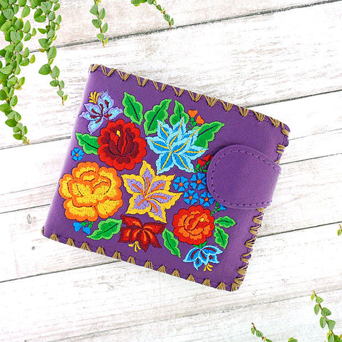 LAVISHY Eco-friendly bohemian style Mexican rose, lily and hibiscus pattern embroidered vegan bifold medium wallet for women. This purple wallet is great for everyday use, lovely gift idea for family & friends especially for people who celebrate Mexico & Mexican culture or just love flowers. Online shopping at LAVISHY BOUTIQUE. Wholesale at www.lavishy.com