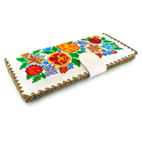 LAVISHY Eco-friendly bohemian style Mexican rose, lily and hibiscus pattern embroidered vegan large flat wallet for women. This white wallet is great for everyday use, lovely gift idea for family & friends especially for people who celebrate Mexico & Mexican culture or just love flowers. Online shopping at LAVISHY BOUTIQUE. Wholesale at www.lavishy.com