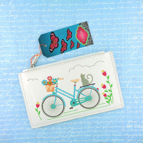 Online shopping for vegan brand LAVISHY's Eco-friendly, ethically made, cruelty free bohemian style vegan flat pouch for women features cat on bicycle embroidery motif. Wholesale at www.lavishy.com for retailers like gift shop, clothing & fashion accessories boutique, book store in Canada, USA, worldwide since 2001.