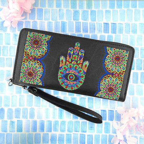 LAVISHY Eco-friendly, ethically made, cruelty free Hamsa/hand of Fatima embroidered vegan large wristlet wallet for women. Wholesale at www.lavishy.com for retailers like gift shop, clothing & fashion accessories boutique & book store worldwide since 2001.