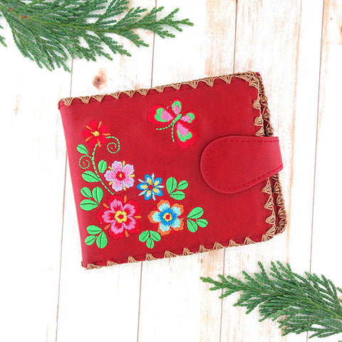 Online shopping foR embroidered flower & butterfly vegan medium wallet for women by vegan brand LAVISHY, this Eco-friendly, ethically made, cruelty free wallet's lovely embroidery motif is framed by decorative stitches around the edge. Wholesale at www.lavishy.com with unique & fun fashion accessories for gift shop, boutique & corporate buyers.