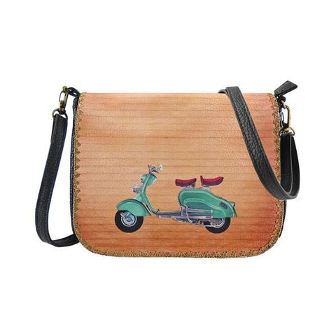 Mlavi vegan cross body bag with retro camera print. It's roomy enough to hold wallet, smart phone and small personal items like key and lip balm. Wholesale at www.mlavi.com for gift shops, fashion accessories & clothing boutiques, museum stores worldwide.