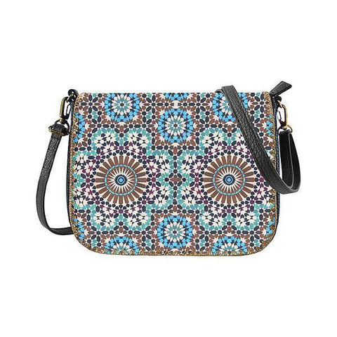 Mlavi Studio's whimsical vegan cross body bag with Bohemian style Moroccan pattern print. It's roomy enough to hold wallet, smart phone and small personal items like key and lip balm. Wholesale at www.mlavi.com for gift shops, fashion accessories & clothing boutiques, museum stores worldwide.