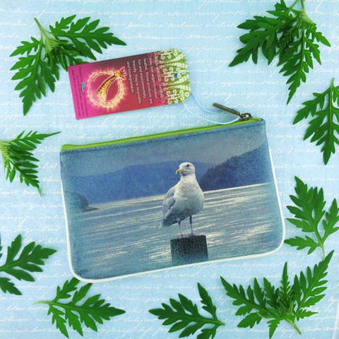 Eco-friendly, cruelty-free, ethically made small pouch/coin purse with seabird & whale print by Mlavi Studio. It's great for everyday use or as gift for animal loving family and friends. Wholesale at www.mlavi.com to gift shop, clothing & fashion accessories boutiques, book stores.