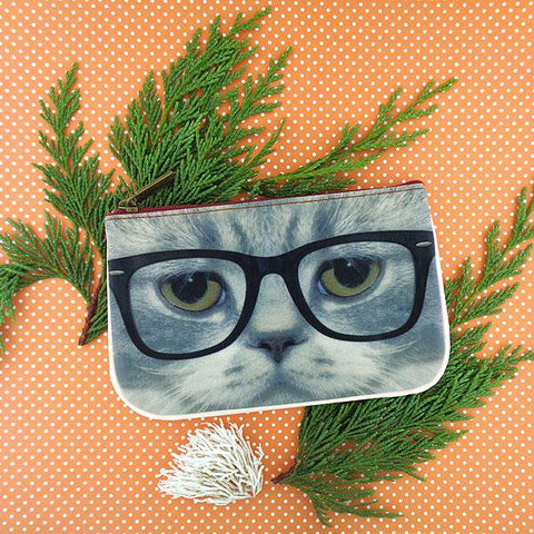 for Eco-friendly, cruelty-free, ethically made vegan/vegan leather small pouch/coin purse features a cute cat print by Mlavi. Wholesale available at http://mlavi.com along with other whimsical fashion accessories