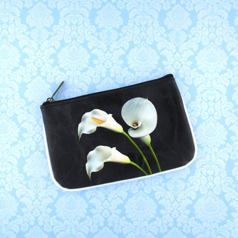 Mlavi calla lily flower print small pouch/coin purse made with Eco-friendly & cruelty free vegan materials. Gift & boutique buyer can order wholesale at www.mlavi.com for ethically made & unique fashion accessories including bags, wallets, purses, coin purses, travel accessories & gifts.