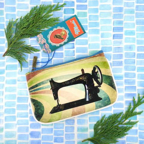 Mlavi's cool retro sewing machine & scissor print vegan small pouch/coin purse made with SGS tested cruelty-free Eco-friendly cruelty free vegan materials. Wholesale available at www.mlavi.com for gift shop, fashion accessories & clothing boutique in Canada, USA & worldwide.
